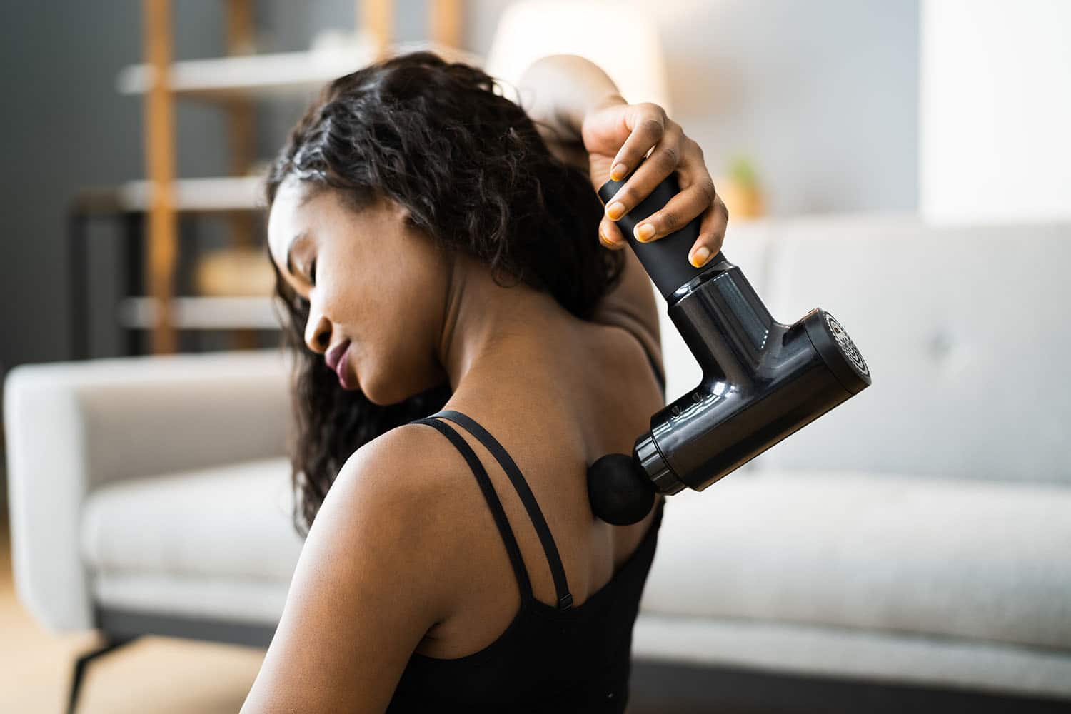 MASSAGE GUNS TO RELIEVE MUSCLE TIGHTNESS